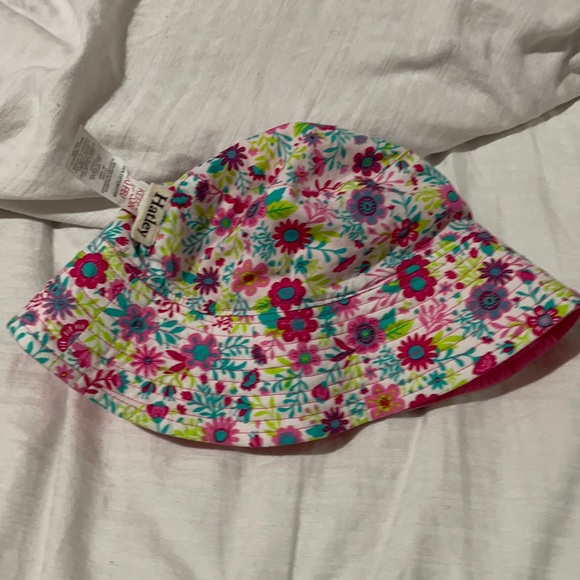 Hatley reversible bucket hat floral to solid pink euc